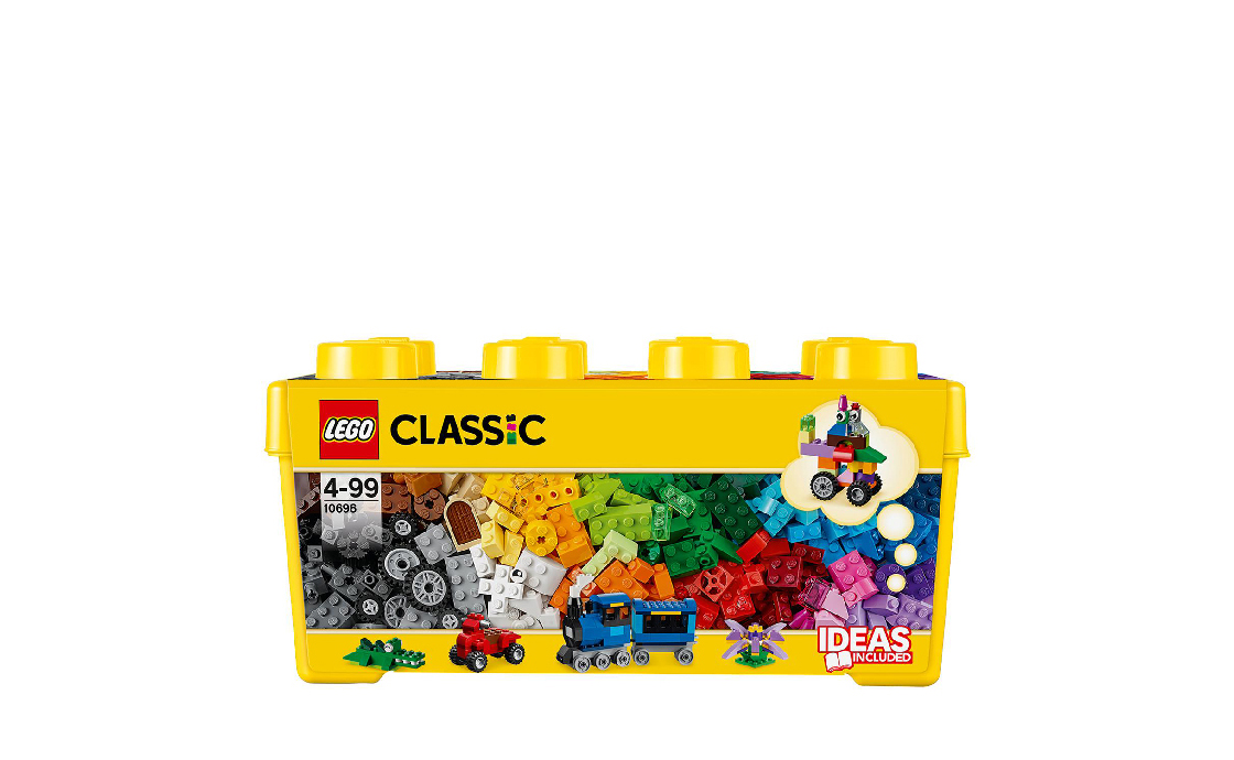 Красива, стилізована під знаменитий кубик LEGO коробка з набором ЛЕГО 10696 Класік таїть в собі помаранчевий роздільник кубиків, масу коліс, будівельні кубики